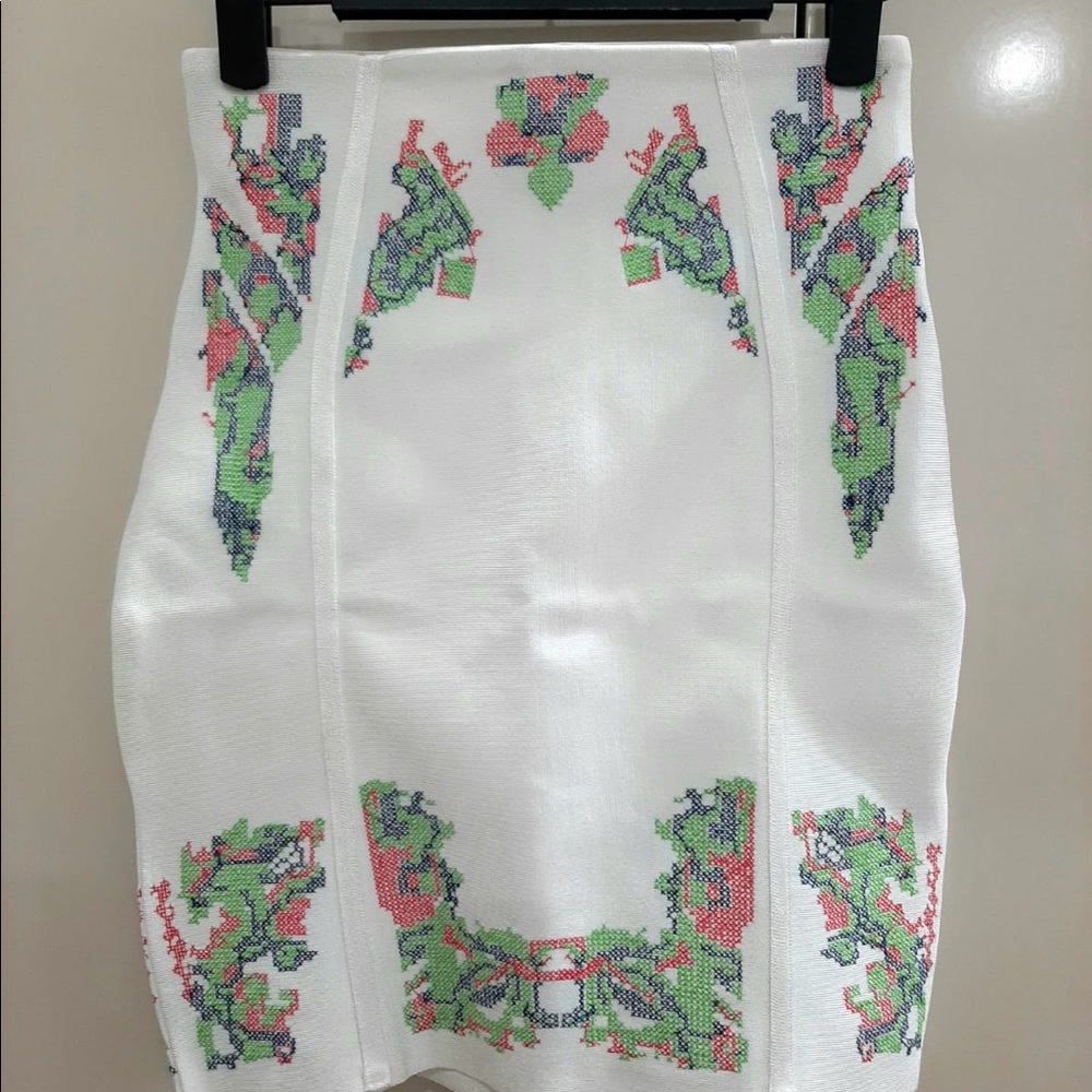 White skirt with a colorful embroidered design